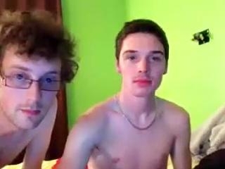 Seductive gay is having a good time in the apartment and memorializing himself on computer webcam