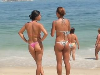 The horny girls from this bikini voyeur video are 