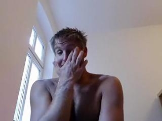 Charming boyfriend is relaxing within doors and filming himself on webcam