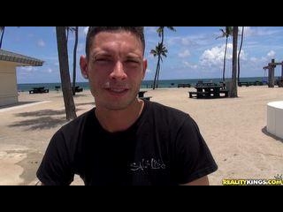 Chanel sucks Tyler\'s cock on a public beach
